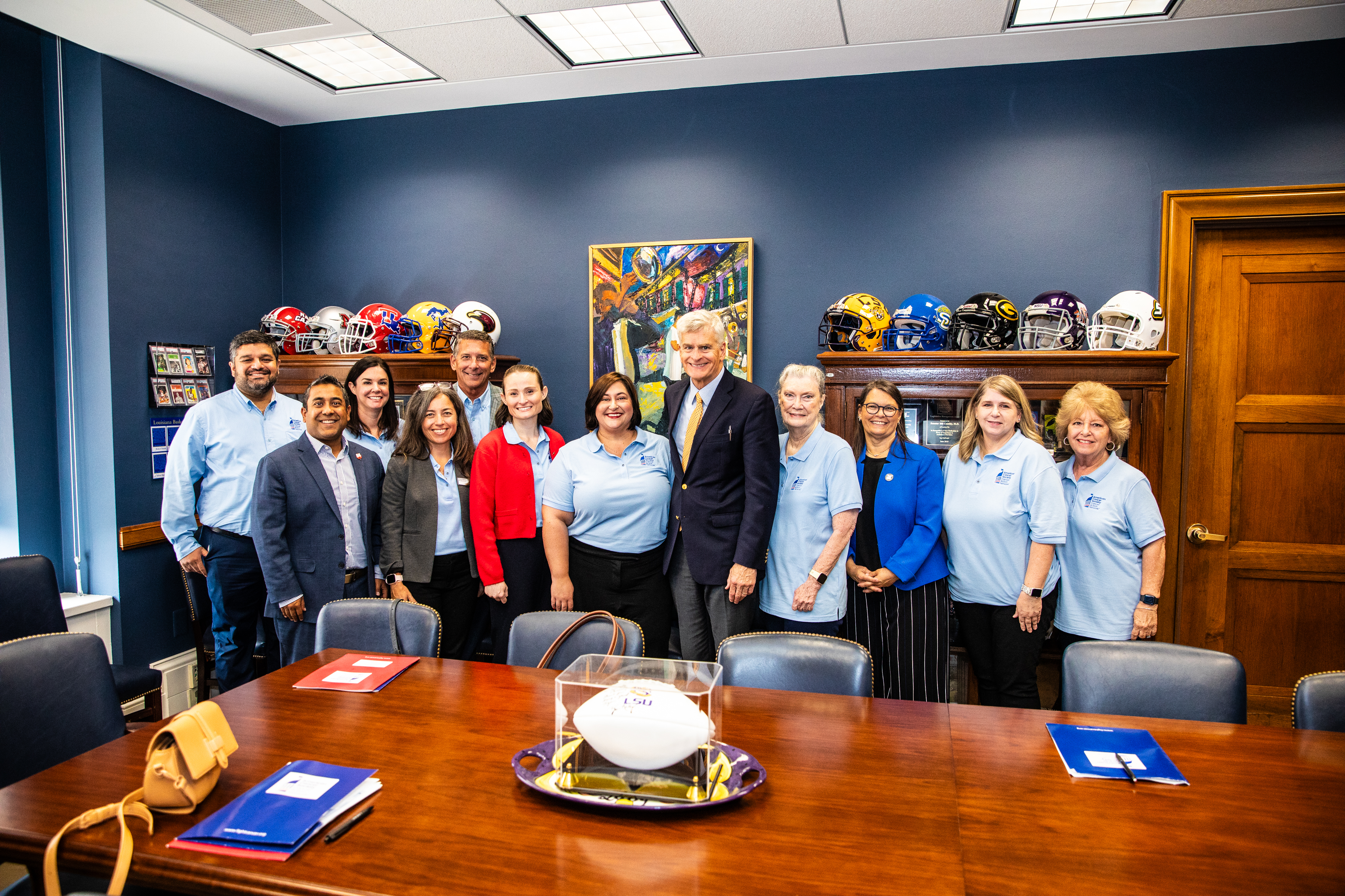 volunteers and team members with lawmaker