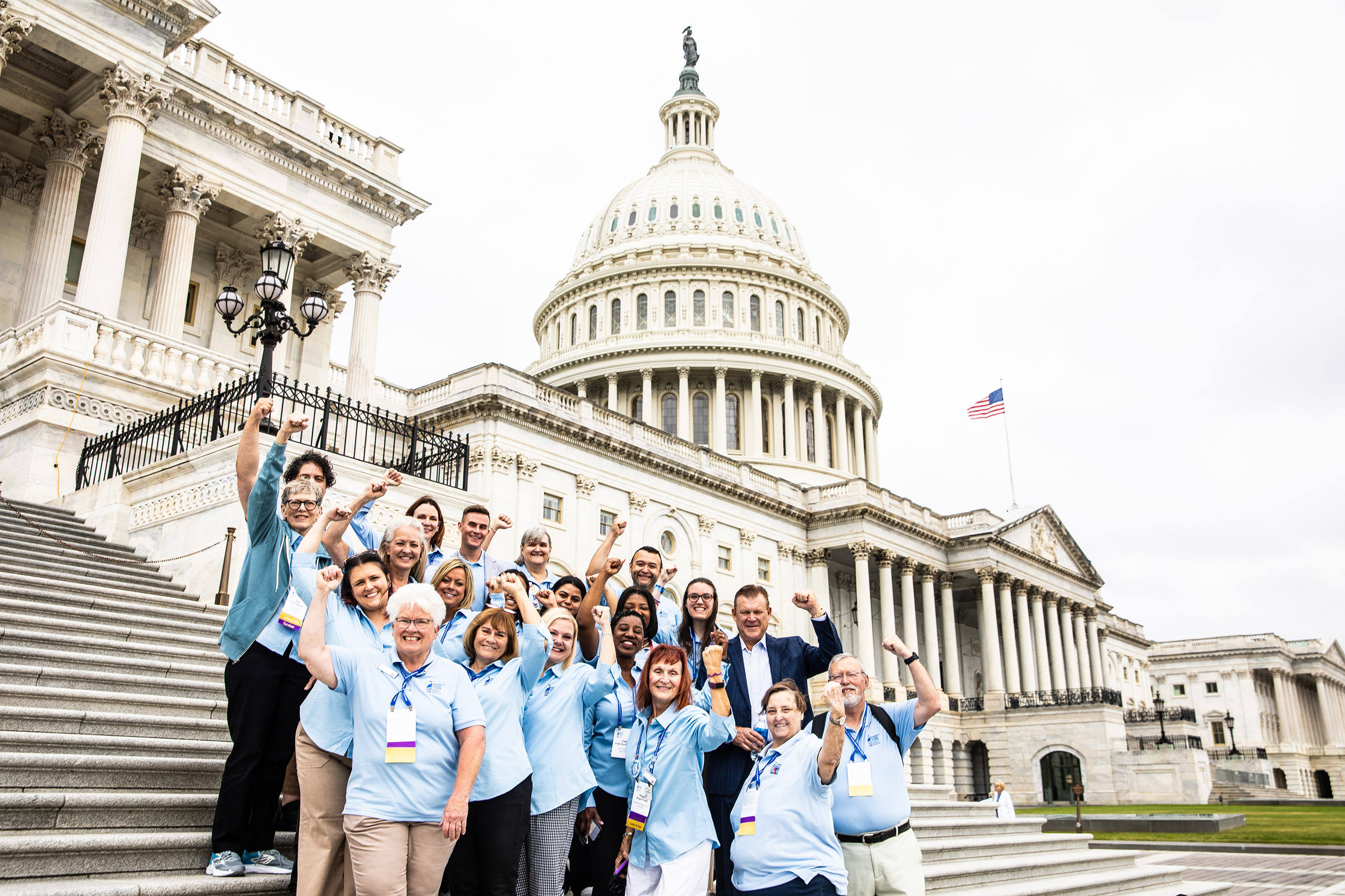 People on the steps of the Capitol