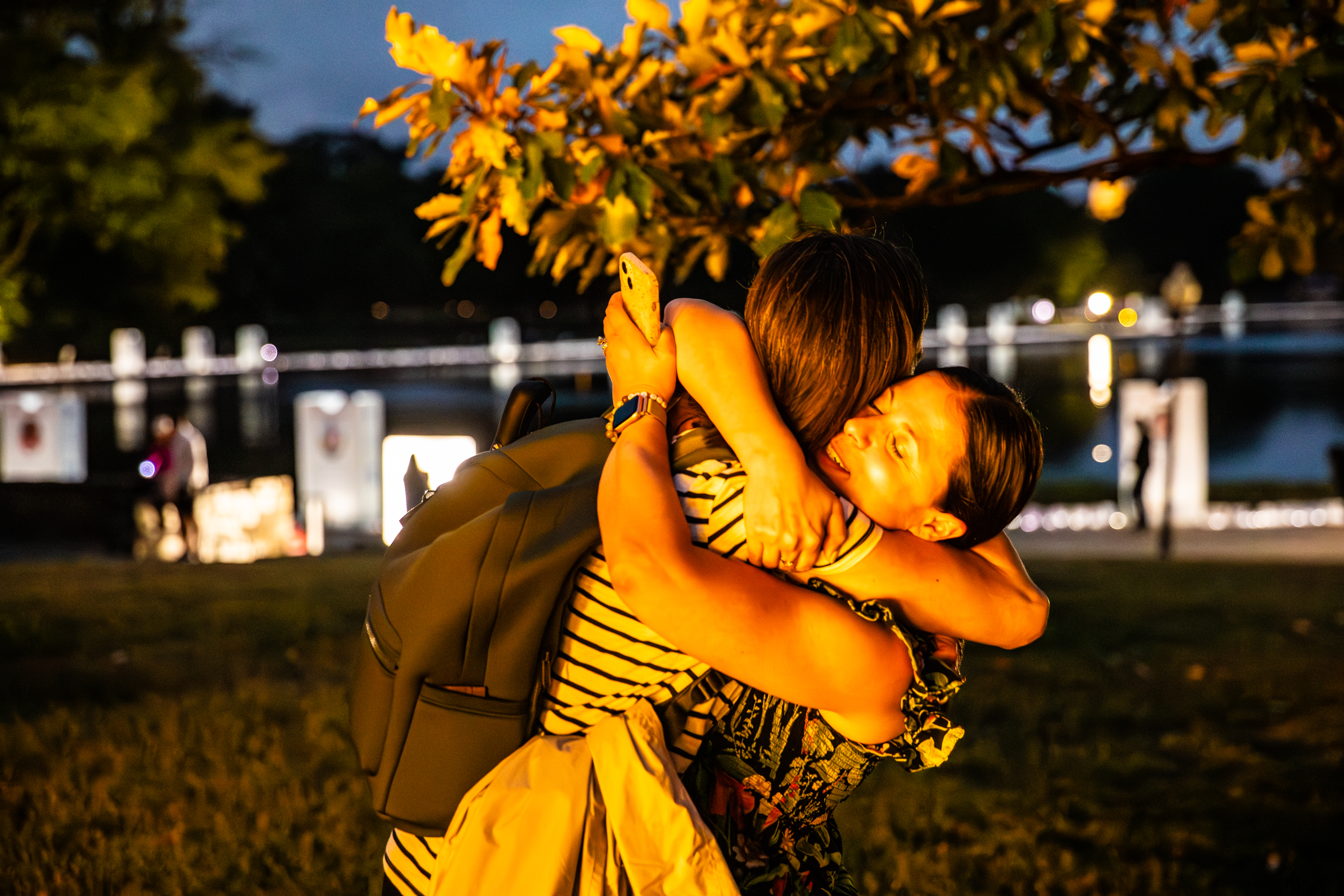 advocates hugging at lights of hope