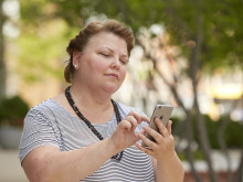 volunteer using a cell phone