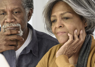 Couple looking at a computer