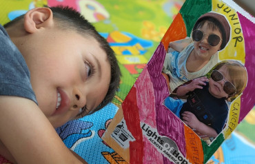 Child looking at a lights of hope bag